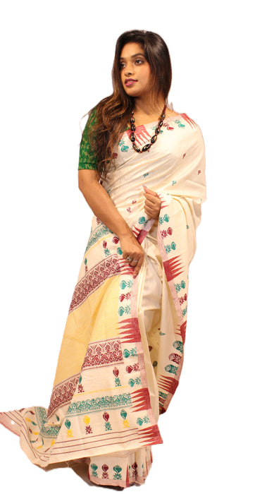 Beautiful natural honey-colored Pure Tussar Silk Saree with intricate traditional motifs, showcasing a distinctive golden sheen and textured weave.