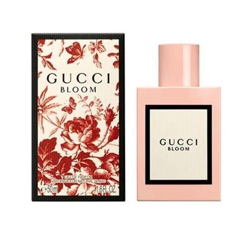 Gucci Bloom Eau de Parfum 50ml bottle, showcasing its pale pink lacquer and floral label.