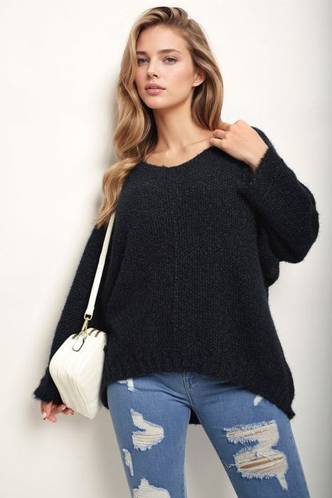 V-neck chunky knitted jumper with oversized fit and cable knit texture β cosy autumn winter sweater for women UK
