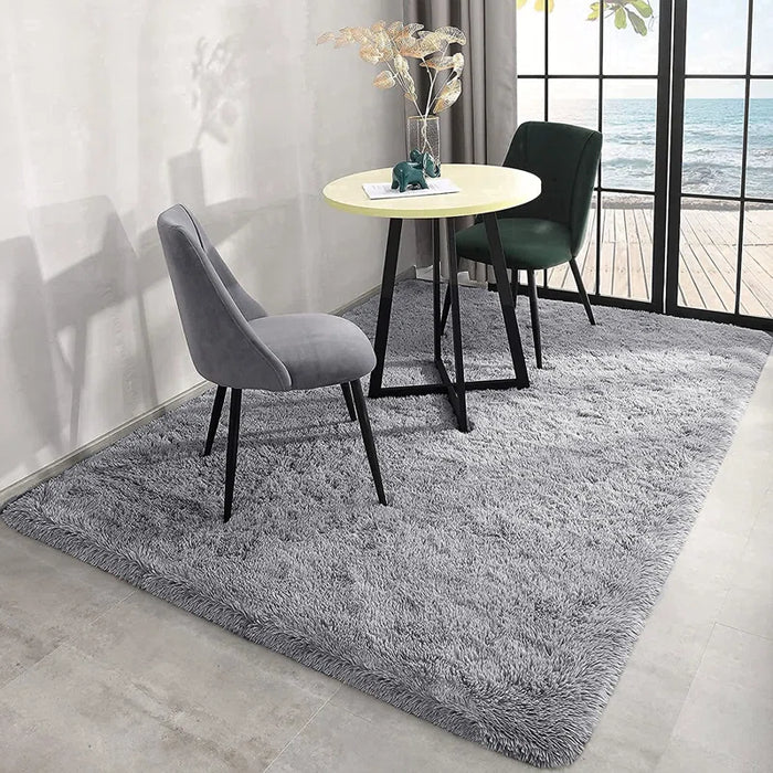 Soft grey shaggy area rug with deep pile and jute backing for cosy indoor and outdoor spaces