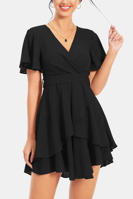 Chic floral mini dress with surplice neckline and flutter sleeves, layered flounce hem