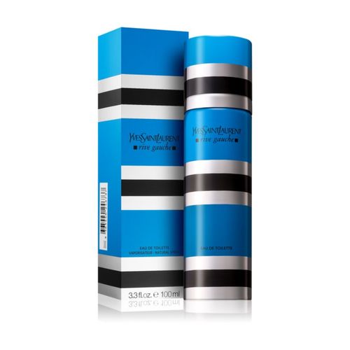 Cobalt blue column bottle of women's perfume with rose, bergamot, vetiver, and musk elements displayed around it