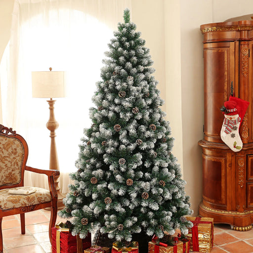 7ft artificial Christmas tree with snowy pine tips and pinecones for indoor holiday décor
