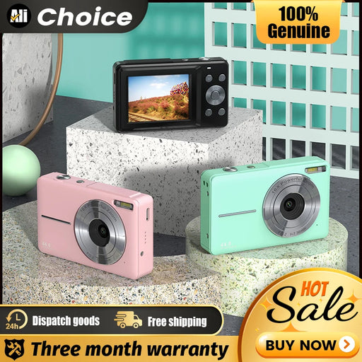 Compact digital camera with 2.5-inch HD screen, 44MP photo resolution, 1080P video recording, and face detection, placed on a desk with travel accessories

