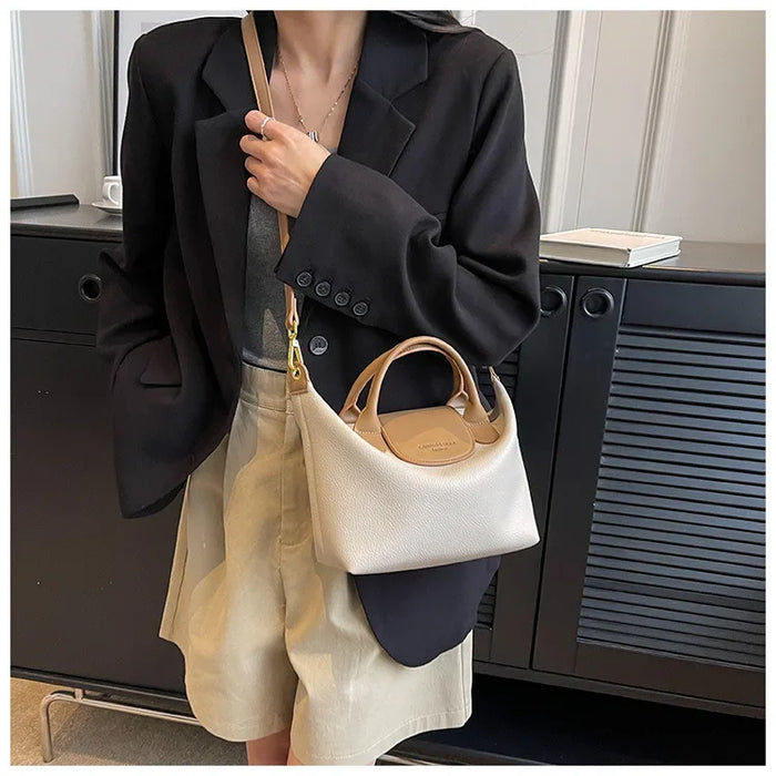 Compact Unisex Barrel-Shaped Crossbody Bag with Modern Flap Design - Samanta Factory