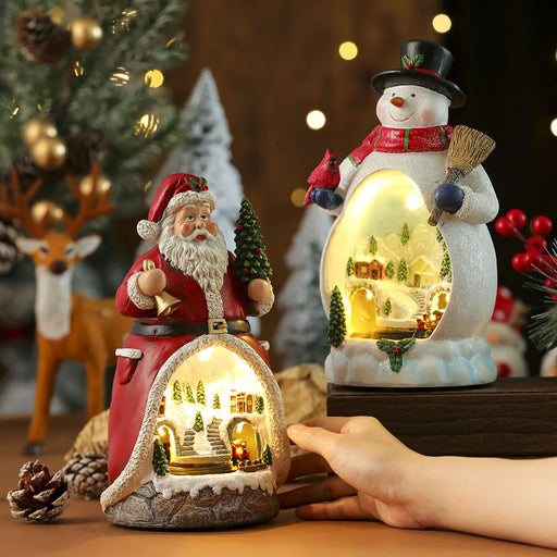 Lighted Christmas Cabin Music Box with LED Santa, Snowman, and Rotating Train
