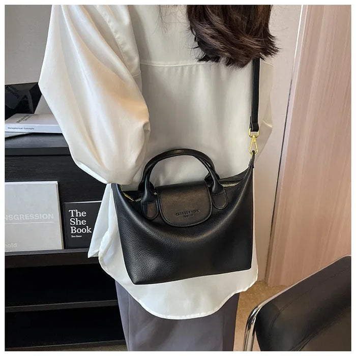 Compact Unisex Barrel-Shaped Crossbody Bag with Modern Flap Design - Samanta Factory