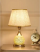 Crystal desk lamp providing soft ambient lighting on bedside table