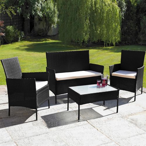 4-piece rattan garden furniture set in black or grey with beige cushions and glass-top coffee table