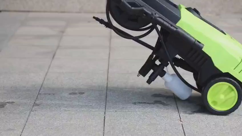 1800W high-pressure jet washer with adjustable nozzle, spray gun, hose, and cleaning accessories

