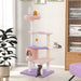 Cloud-shaped platforms with sisal scratching posts on a multi-level cat tree tower in purplish pink, featuring a cozy hammock and hanging star toy.