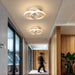 Modern round LED ceiling light with black aluminum body and acrylic shade