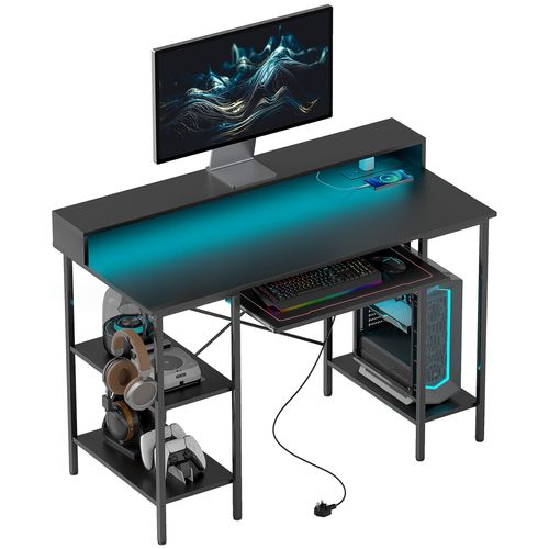 Black ergonomic workstation desk with RGB lights, USB-C ports, and storage shelves