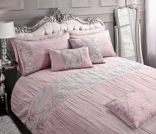 Sequin pleated microfibre duvet cover set with star sequin burst and lace detailing, ideal for a glamorous bedroom style.