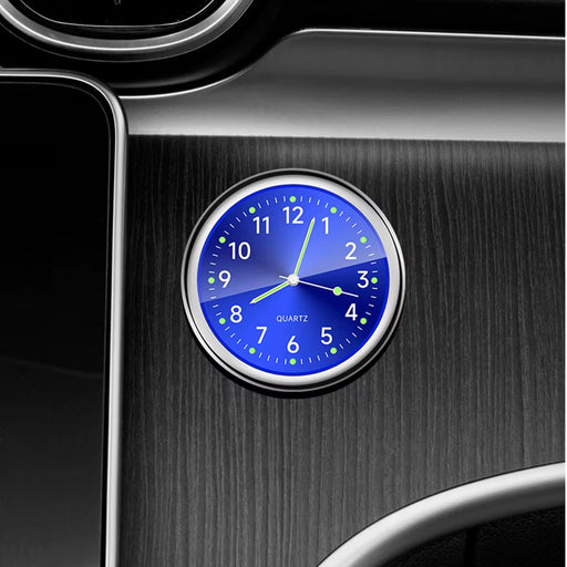 Stylish mini car air conditioner clock with adhesive backing in silver, black, blue, green, and red, featuring a quartz movement and luminous pointer.