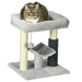 Compact PawHut cat tree with sisal scratching posts, plush bed, and feather toy